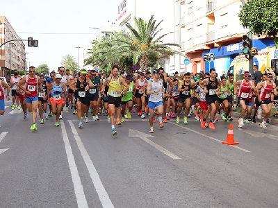 Mario Molina y Mari Carmen Romero ganan la carrera popular de las 'Fiestas de San Juan' en el barrio de La Vi�a